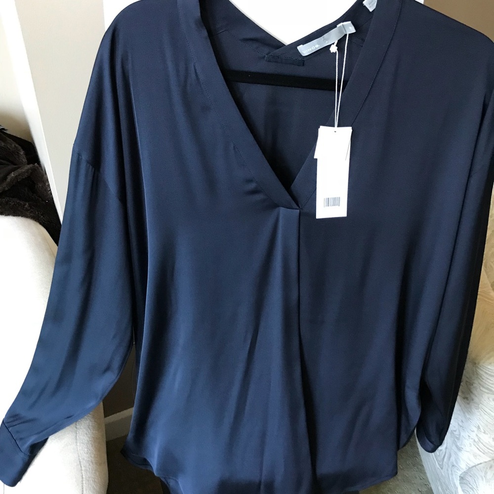 Beautiful navy blue blouse.  Silk. Flattering!